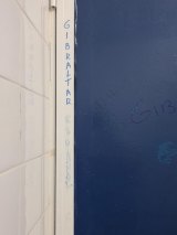 The writing on the toilet door: Gibraltar Español...