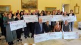 Cheques from The Convent to eight charities