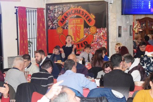 Special Olympics Athletes attending the LETRSO Christmas Dinner at the Manchester United Supporters Social Club.
